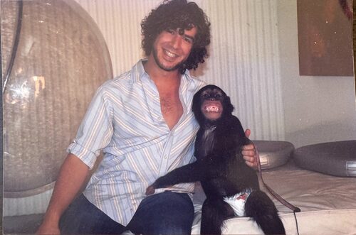 Daniel with a chimpanzee