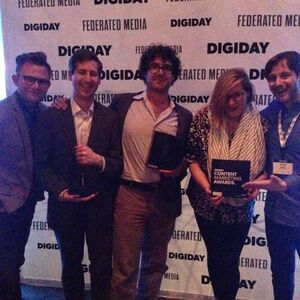 Daniel and the Audible team accepting the Digiday Award