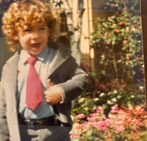 Young Daniel Reiss in a suit